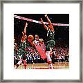 Kyle Lowry And Giannis Antetokounmpo Framed Print