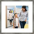 Loving Mother And Son Walking Away From The Doctor's Office While She Looks At Them All Very Happy Framed Print