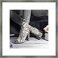Luxury Female High Heel Shoes Made From Snake Skin Worn By A Woman Framed Print