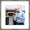 Man Holding Workpiece At 3d Printer Framed Print