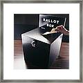 Man Inserting Voting Paper Into A Ballot Box Framed Print