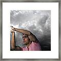 Man Trying To Catch Sun Rays Framed Print