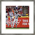 Marcell Ozuna, Christian Yelich, And Giancarlo Stanton Framed Print