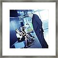 Mature Businessman Looking At Three Young Women. Framed Print