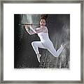 Model Playing Flute Surrounded By White Flour Framed Print