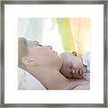 Mother And Baby Girl Sleeping On Bed Framed Print