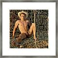 Naked Cowboy Sitting In A Field Framed Print