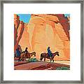 Navajos In A Canyon Framed Print