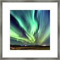 Northern Lights, Aurora Borealis In The Night Sky, Iceland. Thes Framed Print