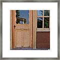 Old Door With Window Reflections Framed Print