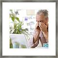 Older Man Looking Stressed With Laptop Framed Print