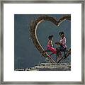 Older Sister With Her Younger Brother At Blangsinga Waterfall Framed Print