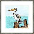 Pelican Perched On Pier Framed Print
