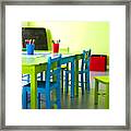 Pencils In Glass On Table Framed Print