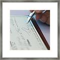 Person Signing Check Framed Print