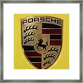 Porsche Emblem On Racing Yellow Framed Print