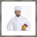 Portrait Of Chef With Bowl Of Capsicum Framed Print