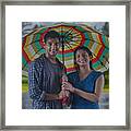 Portrait Of Couple With Umbrella Framed Print