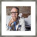 Portrait Of Serious Businessman In Creative Office Framed Print