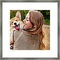 Portrait: Young Woman With Laughing Corgi Puppy, Nature Background Framed Print