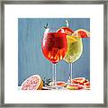 Red And White Aperol Spritz Garnish In Wine Glasses Framed Print