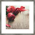Red Roses With Red Ribbon On Wooden Table Framed Print