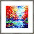Red Trees Reflected In The Water Framed Print