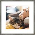 Relaxed Girl With Cat Listening To Music Framed Print