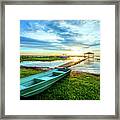 Rowboat At The Water's Edge Framed Print