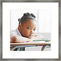 Schoolgirl In Class Framed Print