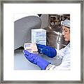 Scientist Removing Human Cell From Liquid Nitrogen Framed Print