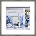 Scientists Working In Laboratory With Microscopes Framed Print