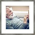 Senior Man Using Smart Phone. Framed Print