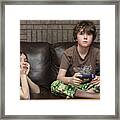 Serious Gamers Framed Print