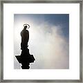 Silhouette Of Virgin Mary Statue In The Morning Mist Framed Print