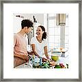 Single Mom Laughing While Preparing Lunch With Son Framed Print