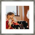 Sister Sticks Her Feet In Her Brothers Face Framed Print