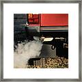 Smoke Coming From Exhaust Pipe Of A Car Framed Print