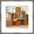 Stack Of Boxes In New House Framed Print