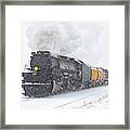 Steam Engine Races Through A Snowstorm Framed Print