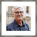 Street Portrait Of Smiling  Senior Man Framed Print