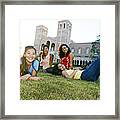 Students Relaxing On Campus Framed Print