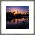 Sunset Over A River Framed Print