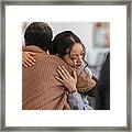 Supportive Women Hug While Attending A Group Therapy Session Framed Print