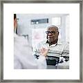 Talking To His Doctor Framed Print