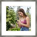 Teenage Girl Texting Framed Print