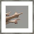 Three Arms Pointing At The Same Direction. Framed Print