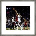 Tim Duncan And Chris Bosh Framed Print