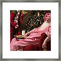 Tired Santa Asleep With Milk And Cookies By Fireplace Framed Print
