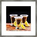 Tree Shot Glasses Of Mexican Tequila Cocktail With Lemon Slices Framed Print